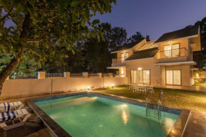 StayVista's Enchanting Haven - Modern Interiors, Sprawling Lawn with Gazebo, Swimming Pool, Indoor Games